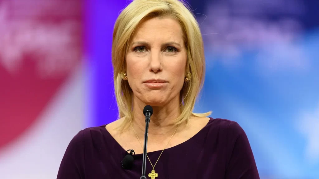 Laura Ingraham Education: A professional image of Laura Ingraham speaking at an event, reflecting her role as a prominent media personality with an educational background in law and political commentary.